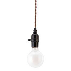 a light bulb hanging from a brown cord