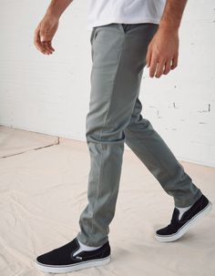 RSQ Skinny Chinos. Formerly known as the "Seattle Skinny Taper Chino Pants". Slant front pockets with welt back pockets and additional decorative pocket with RSQ tag at back left pocket. Approx leg opening: 13.5"(34cm). 97% cotton/3% spandex. Machine wash. Imported.Model is 6'2.5" wearing a size 31x32.Approx outseam: 41"Approx leg opening: 13.5" Fitted Casual Chinos For Summer, Fitted Casual Dress Pants, Casual Fitted Full Length Dress Pants, Casual Slim Fit Bottoms For Summer, Trendy Slim Fit Bottoms With Pockets, Casual Fitted Straight Work Pants, Fitted Bottoms For Business Casual, Summer Casual Fitted Dress Pants, Slim Fit Casual Dress Trousers