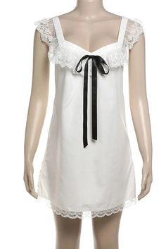 Embrace effortless charm with our Lace V-Neck Backless Bows Suspender Mini Dress. Featuring a flattering V-neckline and delicate spaghetti straps, this dress exudes a blend of elegance and allure. Details: Elasticity: Slight Stretch Fabric Type: POLYESTER Silhouette: STRAIGHT Neckline: V-Neck Material: POLYESTER Material: SPANDEX Size (IN) Bust Length S 34.65 33.07 M 36.22 33.86 L 37.80 34.65 White V-neck Slip Dress With Delicate Straps, White Slip Dress With Straps For Night Out, Elegant Lace Mini Dress With Straps, Elegant Camisole Mini Dress For Daywear, Feminine V-neck Mini Dress With Delicate Straps, White V-neck Slip Dress With Adjustable Straps, V-neck Mini Dress For Wedding Night In Spring, White Slip Dress With Sweetheart Neckline For Date Night, White Slip Dress With Adjustable Straps For Date Night