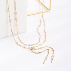 Description:Dainty Layered Rhinestone Charm Tassel Belly Chain SetSpecification:Material: Alloy Metal. RhinestoneLength: 26.7" + 9.8" extWeight: 0.39 oz/setChain Colors: Gold/SilverFeatures & Details:This layered rhinestone charm tassel belly chain set is made of environmental friendly materials. which is solid. durable. lightweight and very comfortable and healthy for daily wear. This handmade body jewelry is decorated with unique design and superb craftsmanship to create special piece that can Elegant Gold Crystal Body Chain, Elegant Metal Body Chain With Delicate Chain, Elegant Metal Body Chain With Delicate Detail, Elegant Crystal Body Chain, Gold Crystal Body Chain With Adjustable Chain, Dainty Gold Rhinestone Necklace For Party, Adjustable Gold Rhinestone Necklace With Chain, Gold Crystal Lariat Necklace, Gold Crystal Backdrop Necklace With Adjustable Chain