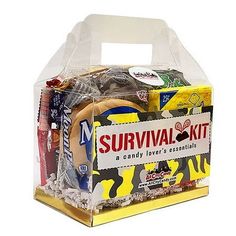 the survival kit is packed in a clear plastic box with gummy and other items