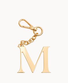 Personalize It    Customize your handbag, keychain, and more with a monogram charm made from jewelry-grade hardware with a special 24k gold coating that protects from signs of wear. Luxury Logo Bag Charm For Gift, Luxury Logo Bag Charm As Gift, Gold Logo Charm Bag Charm, Luxury Everyday Jewelry With Logo Charm, Gold Jewelry With Metal Logo For Gifts, Gold Jewelry With Metal Logo As A Gift, Luxury Gold Bag Charm As Gift, Luxury Keychain With Key Clip For Gift, Luxury Keychain With Key Clip As Gift