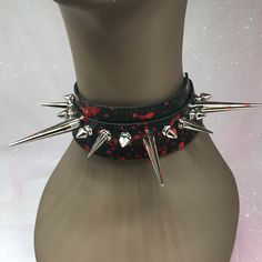 Made by me  *with love  *Cruelty free faux leather *adjustable  *16 inches  * each on is customized so will vary some. Please keep that in mind. Edgy Metal Choker For Cosplay, Adjustable Grunge Choker For Cosplay, Red Punk Choker For Festivals, Adjustable Punk Choker For Cosplay, Adjustable Emo Choker For Cosplay, Adjustable Punk Style Choker For Cosplay, Punk Spikes Choker For Party, Punk Spiked Choker For Parties, Gothic Spiked Choker For Festivals