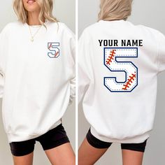 Custom Baseball Sweatshirt, Baseball Team Sweatshirt, Baseball Numbers Sweatshirt, Personalized Baseball Sweater, Custom Sports Sweater **Discover Comfort and Durability - Our sweatshirts are expertly crafted from a blend of 50% cotton and 50% polyester, ensuring both comfort and durability. - Featuring a medium-heavy fabric weighing 8.0 oz/yd² or 271.25 g/m², they provide optimal warmth and coziness. - Designed with a loose, unisex fit, our sweatshirts offer versatility for various occasions. **Ordering Made Easy - Find your perfect fit by referring to our size chart and selecting your preferred color. - Add your chosen sweatshirt to your cart with a simple click. - Feel free to repeat these steps for multiple purchases, and when you're ready, proceed to checkout. **Care Instructions for Baseball Numbers, Baseball Sweater, Sports Sweater, Baseball Sweatshirts, Team Sweatshirts, Sport Sweater, Personalized Baseballs, Baseball Team, Perfect Fit