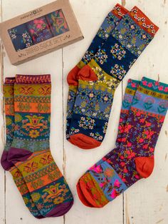 Our Boho Sock Set in our plum floral prints will brighten up any outfit in a playful and boho-colorful way. Wear these comfy socks with your favorite shoes while you're running errands, grabbing a coffee, or just hanging around the house! They’re not too loose or too tight -- they fit just right! These socks come in a set of three and are the perfect gift for anyone on your list. Plus, this adorable sock set is already packed in a box for easy gift giving! Boho Socks, Colorful Website, Colorful Sneakers, Comfy Socks, Fun Socks, Cozy Throw Blanket, Cute Gift Boxes, Cozy Socks, Boho Accessories