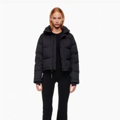 Cropped Goose Down Puffer Jacket Black Fitted Sporty Puffer Jacket, Sporty Fitted Black Puffer Jacket, Fitted Sporty Puffer Jacket For Fall, Sporty Fitted Puffer Jacket For Fall, Black Cropped Jacket With Ribbed Cuffs For Fall, Fall Black Puffy Outerwear, Black Puffer Cropped Jacket For Fall, Black Long Sleeve Puffer Cropped Jacket, Aritzia Super Puff Short