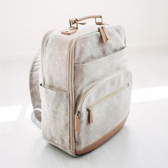 Our Lyra Camera Backpack is one of the most stylish and best camera bags for women. It's also great as a Laptop Bag, Weekender Bag and Diaper Bag. Backpack With Luggage Sleeve For On-the-go, Everyday Rectangular Backpack With Luggage Sleeve, Beige Backpack For On-the-go, Versatile Laptop Backpack For Trip, Travel Diaper Bag With Zipper Pocket, Beige Travel Camera Bag With Adjustable Strap, Beige Camera Bag With Adjustable Strap For Travel, Versatile Backpack With Adjustable Straps, Rectangular Laptop Backpack For On-the-go