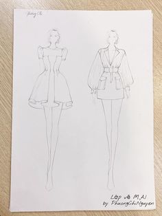 a drawing of two women's dresses on top of a piece of paper