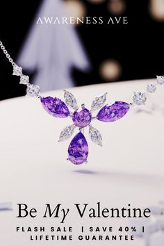 Fall in love with the Blossom Floral Brilliant-Cut Necklace this Valentine’s. Crafted with finesse, S925 silver, and vibrant purple gems, it’s a gift that says more. Shop our sale for 40% off and celebrate love with Awareness Avenue, where every purchase helps craft a better future. #FloralNecklace #ValentinesDayGift #ElegantJewelry Mother's Day Brilliant Cut Jewelry For Formal Wear, Elegant Jewelry For Mother's Day Party, Elegant Pendant Necklace For Mother's Day, Cubic Zirconia Necklaces For Mother's Day Party, Brilliant Cut Jewelry As A Gift For Her, Mother's Day Party Necklace With Cubic Zirconia, Mother's Day Party Necklaces With Cubic Zirconia, Purple Flower-shaped Jewelry For Weddings, Elegant Purple Clavicle Chain Necklace