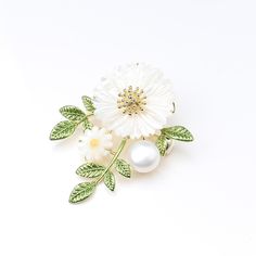 This beautiful Engraved Fritillary Daisy Brooch with Pearl is a timeless piece of jewelry. Crafted with sterling silver and a hand-polished pearl, this brooch is sure to be admired for its intricate detailing and elegant design. A perfect addition to any jewelry collection. Collection: Radiant Pins Product Type: Brooch Material: Natural Fritillary, Pearl, 18k Gold Plating Brass Dimensions: Height: 46 mm, Width: 39 mm Lucky Bracelet, Loose Stones, Timeless Pieces, Elegant Design, Jewelry Box, Daisy, 18k Gold, Jewelry Collection, Gold Plate