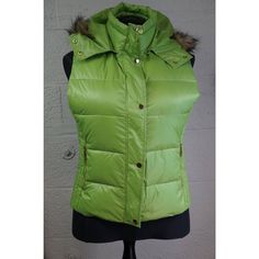 Step Out In Style With This Fashionable And Modern Tamsy Puffer Vest Featuring A Faux Fur Hood. This Vest Is Made Of Durable Polyester And Comes In A Beautiful Green Color That Adds A Pop Of Color To Any Outfit. It Features A Zipper Snap Button Closure, Sleeveless Design, And Is Available In Size Xl For Women. Perfect For Various Occasions Such As Engagement, Christmas, Wedding, Anniversary, Birthday, And Gifts, This Vest Is A Great Addition To Any Winter Wardrobe. The Solid Pattern And Regular Fitted Vest Outerwear For Cold Weather, Hooded Solid Color Vest For Spring, Trendy Hooded Spring Vest, Trendy Hooded Vest For Spring, Fall Sleeveless Outerwear With Detachable Hood, Fall Vest With Detachable Hood, Sleeveless Vest With Detachable Hood For Fall, Fall Sleeveless Vest With Detachable Hood, Fitted Puffer Vest For Cold Weather