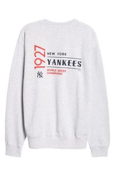 A comfort lover's MVP, this soft fleece sweatshirt hits a style home run with left-field embroidery celebrating your favorite team. 27" length (size Medium) Crewneck Ribbed cuffs and hem 97% cotton, 3% polyester Machine wash, dry flat Made in Portugal Asian & Pacific Islander Owned/Founded Field Embroidery, Pacific Islander, Champion Crewneck, Home Run, Sporty And Rich, Fleece Sweatshirt, Style Home, New York Yankees, Heather Gray