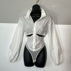 Description: White Button Down Shirt Body Suit. Mesh Bottom With Snap Closure. Sexy Cut Outs At Breastnice Elastic, Ballon Sleeves. Size: M Brand: Rehab Lab Condition: New - Never Worn Color: White Bust: Pit To Pit: 18” Fabric: Cotton, Spandex, Nylon Star Posh Ambassador Quality Merchandise A2 Accepting All Reasonable Offers Ships In One Day Comment Any Questions Black Tank Top Bodysuit, White Long Sleeve Bodysuit, Yellow Bodysuit, Burberry Print, Tank Top Bodysuit, Practice Wear, High Neck Bodysuit, Cami Bodysuit, Square Neck Bodysuit