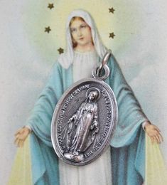 Traditional Miraculous Mary medal. This silver oxidized medal has gorgeous details and would be a lovely addition to your next rosary or jewelry project. It is imported from Italy and ready to be used in your next jewelry design. The Miraculous Medal is one of the most popular Catholic medals. It was created by St. Catherine Laboure following a vision of the Blessed Virgin Mary in 1830. This medal is believed to bring special intercessions on behalf of the Blessed Virgin Mary if worn with faith Spiritual Oval Miraculous Medal Jewelry And Charms, Spiritual Oval Miraculous Medal Jewelry, Vintage Sterling Silver Miraculous Medal, Vintage Sterling Silver Miraculous Medal Jewelry, Spiritual Jewelry With Miraculous Medal As Gift, St Catherine Laboure, Catherine Laboure, The Immaculate Conception, The Blessed Virgin Mary