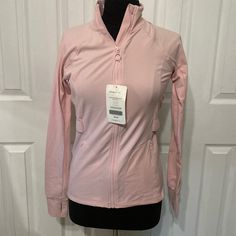 Fabletics Light Pink Sport Jacket New With Tag Size Small Pet Friendly House Reasonable Offers Accepted Bundle For More Offerss Pink Long Sleeve Activewear For Fall, Pink Fitted Track Jacket For Sports, Pink Long-sleeve Activewear For Fall, Fitted Pink Track Jacket For Sports, Pink Stretch Track Jacket For Sports, Pink Fitted Athleisure Track Jacket, Pink Fitted Track Jacket Athleisure Style, Fitted Pink Athleisure Track Jacket, Pink Athleisure Outerwear With Long Sleeves