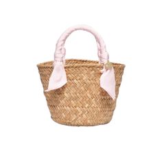 This Mini Rosie is so petite and precious, will store all of your vaca essentials while keeping a chic vibe. Grosgrain ribbon handles make this a timeless tote you’ll reach for your next summer get away. A blush pink that is timeless and versatile, compliments any of your luxe looks. Handcrafted from all-natural woven straw using a time-honored Filipino basketweaving technique. Features grosgrain ribbon handles. Measures 9" W by 6.5" H by 6"D with a 4.25" handle drop. Tote Bag Craft, Woven Purse, Rattan Dining, Natural Weave, Rattan Dining Chairs, Straw Tote Bag, Straw Tote, Pink Tote, Women Artisans