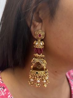 ruby  Temple lakshmi ji earrings,traditional earrings,indian earrings,indian jhumkas,south indian earrings,temple earrings,ethnic earrings OCCASION: PARTY WEAR, WEDDING, MARRIAGES, CASUAL, DAILY WEAR These Earrings set have an excellent finish Ideal Gift Idea: Perfect beautiful & memorable gift for you and your loving wife, girlfriend, sister, aunt, daughter, and mom/mother/mummy. CARE Avoid Contact With Chemicals Such As Perfumes Or Any Sprays. Avoid Contact With Water. Use Butter Paper Or Cott South Indian Earrings, Daughter And Mom, Temple Earrings, Butter Paper, Loving Wife, Earrings Indian, Traditional Earrings, South Indian Jewellery, Indian Earrings