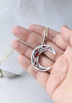 ITEM DESCRIPTION: The size of this circle pendant H 4 cm x W 3 cm. Weight - 4g. You can buy this necklace with a chain or without and with different stones. Jewelry will come to you in a gift box - ready for gift giving. I made this moon necklace of sterling silver, red garnet, and tiny labradorite. I think this color combination is very elegant and luxurious! The parcel will be sent 1-2 days after payment. Delivery usually takes 10-21 days. But in the period from December to February this may t Spiritual Moon Phase Pendant Jewelry, Celestial Necklace With Large Round Pendant, Spiritual Moon Shaped Coin Pendant Jewelry, Celestial Style Necklace With Large Round Pendant, Sterling Silver Crescent Spiritual Jewelry, Spiritual Crescent Sterling Silver Jewelry, Spiritual Sterling Silver Crescent Jewelry, Celestial Sterling Silver Round Pendant Jewelry, Sterling Silver Sun And Moon Round Pendant Jewelry