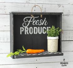 a sign that says fresh produce with carrots and parsley in front of it