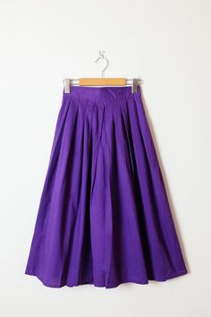 "Vintage Purple Cotton Midi Skirt from 80's. Measurements Total Length: 29 1/2\" Waist             : 23\"  Hips               : Free Condition     : Gently used. There`s no stains or holes. Good condition.  ※Please read the policy before you purchase※" Vintage Cotton Flared Skirt Bottoms, Vintage Cotton Flared Skirt, Vintage Long Skirt With Relaxed Fit, Retro Pleated Full Skirt Bottoms, Retro Solid Bottoms With Lined Skirt, Vintage Long Gathered Skirt Bottoms, Vintage Long Gathered Skirt, Purple Full Skirt Bottoms For Spring, Vintage Cotton Midi Skirt