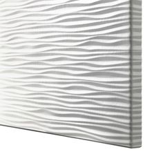 a white wall with wavy lines on it