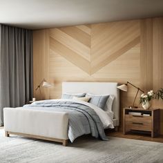 a bedroom with wood paneling and white bedding in the corner, along with two nightstands on either side