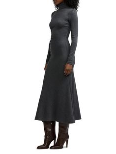 "Find RALPH LAUREN Turtleneck Wool Midi-dress on Editorialist. Crafted of Italian wool, Ralph Lauren's midi-dress showcases A turtleneck and fitted long sleeves. Turtleneck Long sleeves Pulls over 100% wool Lining: 95% cupro/5% elastane Dry clean Made in Italy SIZE & FIT Model measurements: 5'10\" tall Model is wearing a US size Small ABOUT THE BRAND Synonymous with classic Americana style, Ralph Lauren started his collection of brands in 1967 with one item-the necktie-under the name Polo. Four Winter Evening Turtleneck Midi Dress, Fitted Turtleneck Midi Dress For Winter, Stretch Turtleneck Midi Dress For Winter, Fall Turtleneck Midi Dress For Workwear, Ralph Lauren Turtleneck, Turtleneck Midi Dress, Jersey Turtleneck, Long Sleeve Turtleneck Dress, Americana Style