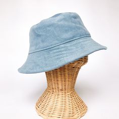 "The perfect bucket sun hat for women,men, babies and kids! Made from 100% cotton sky blue corduroy makes this hat very comfortable to wear. I made this hat with a day of adventure in mind, somewhere sunny and wild! This hat is made from a sky blue 100% cotton corduroy fabric. Inside liner is white cotton. All baby and child sizes come with chin straps. Brim measures approx. 2.5\" wide. Crown measures approx. 3.5\" deep. Available in sizes: 0-3 mos. - 12\" to 14\" head circumference 3-6 mos. - 1 Toddler Bucket Hat, Baby Summer Hat, Beach Bucket Hat, Blue Bucket Hat, Corduroy Bucket Hat, Corduroy Hat, Floppy Beach Hat, Summer Hats Beach, Bucket Hat Women