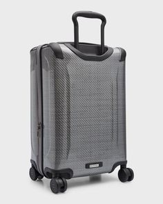 The long-lasting build and integration of recycled materials make this a sustainable choice for work trips, long weekends and travel abroad. Its sleek aesthetic is as enduring as its construction.Carry-on is made of polypropylene and leather with polyester lining.TUMI+ compatibility for enhanced functionality and a personalized packing experience.Compression straps.Hanger bracket.Zip mesh pocket.Protective bumpers.Split case zip entry to main compartment Modern Nylon Luggage For Business, Versatile Nylon Luggage For Business Trips, Modern Luggage With Sleeve For Commuting, Rectangular Nylon Travel Accessories For Business, Classic Nylon Travel Bag With Luggage Sleeve, Business Rectangular Nylon Travel Accessories, Modern Nylon Luggage For Trips, Versatile Nylon Business Luggage, Modern Travel Accessories With Leather Trim