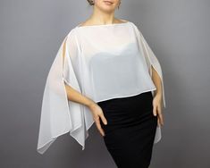 A very elegant chiffon shrug capelet for your wedding party or evening dress. Made of luxury light chiffon. Color: white (other colors are available)  Size: unique (fits all), but if you have any doubts, please contact me. WE have matching bags in our Etsy Shop! WE accept credit cards! Elegant White Shrug For Formal Occasions, Luxury Chic Capelet For Evening, Elegant White Formal Shrug, White Fitted Shrug For Evening, Elegant White Capelet For Wedding, Chiffon Shrug, Blue Shrug, Shrug Jacket, Wedding Capelet