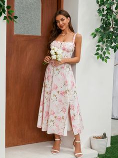 You'll feel ultra feminine in our Carmen Pink Peony Print Cotton Bustier Sundress, which is the perfect fit for Spring and Summer garden parties. It's cut from stretch cotton-rich fabric in a gorgeous vintage print and has a corseted bodice to cinch the fit with a beautiful lace-up back. The gathered bust has a drawstring tie and the side split adds a little sexiness to reveal a flash of leg. It's fully lined for comfort and zips to the side for easy on. Wear yours with delicate mid-heels in whi Fitted Floral Print Midi Dress For Garden Party, Floral Print Sundress With Sweetheart Neckline For Garden Party, Floral Sundress With Sweetheart Neckline For Garden Party, Fitted Sundress With Sweetheart Neckline For Garden Party, Fitted Bodice Sundress For Garden Party, Midi Length, Elegant Sundress With Floral Print And Sweetheart Neckline, Elegant Floral Sundress With Sweetheart Neckline, Elegant Sundress With Sweetheart Neckline And Floral Print, Fitted Floral Sundress With Rose Print