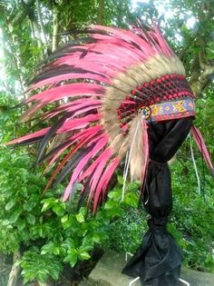 This Indian headdress replica is entirely handmade and truly adorable. Ties in the back for a perfect fit. This will be precious for festivals, photos, a costume, or even room decor. One size fits most ✈️ Worldwide shipping 🐤 I only use authentic feathers ⛺️ I guarantee highest Bohemian Headpieces For Carnival Festival, Bohemian Headband For Costume Occasions, Bohemian Headband For Costume, Bohemian Headpieces For Carnival And Festivals, Handmade Bohemian Costume Hats And Headpieces For Festivals, Multicolor Bohemian Costume Hats And Headpieces For Festivals, Bohemian Costume Hats And Headpieces With Feathers For Festivals, Bohemian Handmade Costume Hats And Headpieces For Festivals, Bohemian Adjustable Headpiece For Costume