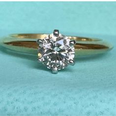 an engagement ring with a diamond in the center