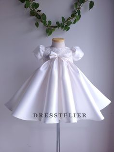 << Off-white mikado pleated dress >> This dress is made of high quality mikado and beaded lace. Hand sewn beaded lace applique on the bodice and on the back bow.   It has soft crinoline inside of the skirt.  Fully lined with 100% cotton lining. Back zipper.  Bows are included in this order. For sizing, please check the size chart.  Designed and handmade by me in my studio.  Please follow @Dresstelier DM me if you have any questions. Thank you! Mini White Dress, White Dress Wedding, White Beaded Dress, Dress Birthday Party, Dress Tulle, Dress Birthday, Birthday Party Dress, Dress Inspo, Dress Mini