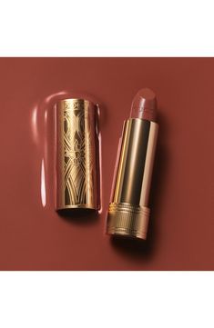 What it is: A lipstick that delivers a perfect and long-lasting satin finish.What it does: It leaves lips smooth, soft and covered in lightweight, comfortable color. It is presented in a gold tube etched with a decorative style drawn by Alessandro Michele. How to use: Apply directly to lips. Use the sharp edge to contour. 0.12 oz. Paraben-free; sulfate-free; phthalate-free Vegan Made in Italy Gilded Era, Gucci Beauty, Tv Stand And Coffee Table, Beauty Society, Hollywood Movies, Satin Lipstick, Bold Color Palette, Buy Gucci, Alessandro Michele