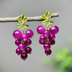 A bountiful harvest and a sweet life are the symbols of grapes. Vitality is the meaning of the leaves. These grapes earrings bring sincere blessings whether for your own use or as a gift for the one you love. May these earrings brighten up your life. 🙂 All my jewellery is designed and made at home. Handmade with love.   🙂Introducing our stunning handmade earrings, a pair of earrings made with glass beads and S925 Hypoallergenic silver posts. The overall design is natural and unique, lovely and Grape Accessories, Fruit Earring, Grapes Earrings, Grape Earrings, Handmade Gifts Diy, Gifts For Her Birthday, Glass Fruit, Fruit Food, Jewelry Cute