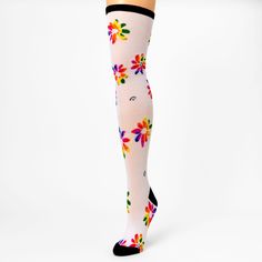 Wear these happy rainbow daisies with pride, for costume parties, parades, and any other time you want to really make a statement! Over-the-knee socks look great with skirts, shorts, and dresses, and they're a fashion essential that never really goes out of style. Pack Size: 1 pair One size Approx. shoe sizes: 12 youth to 7 ladies Material: Nylon - Claire's Rainbow Stripe Mesh Over The Knee Socks Fun Multicolor Socks For Spring, Playful Multicolor Knee-high Socks, Fun Multicolor Summer Socks, Fun Multicolor Spring Socks, Trendy Multicolor Socks For Spring, Summer Knee-high Stretch Stockings, Summer Stretch Knee-high Stockings, White Fitted Knee-high Socks For Summer, Fitted White Knee-high Socks For Summer