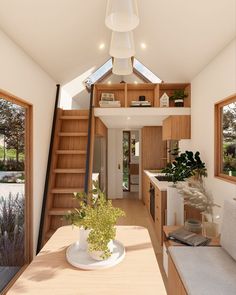 the interior of a tiny house with stairs