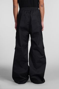 Cargobelas Pants in black cotton, oversized fit, coulisse closure, front zip closure, cargo pockets, four pockets, 97% Cottone 3% Spandex, Made in Italy, Model is 183 cm and wears 48 | Rick Owens Men's Cargobelas Pants in Black Cotton | SS24 Rick Owens Pants, Pants Outfit Men, Rick Owens Men, Japanese Denim, Fashion Line, Luxury Retail, Rick Owens, Pants Outfit, Oversized Fits