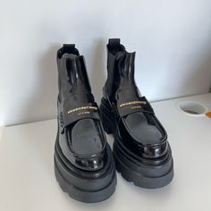 Size: 39.5 Original Price: 795.00 Dollars Before Tax It Will Be Delivered With Original Box. Electronic Invoice Will Be Provided If Needed. Condition: Only Tried On Once Small Damage Inside Please Let Me Know If You Have Questions Regarding The Details Of The Shoes And Their Price. Platform Patent Leather Loafers With Round Toe, Black Leather Platform Loafers With Reinforced Heel, Luxury Black Platform Loafers, Black Loafers With Reinforced Heel And Round Toe, Patent Leather Platform Loafers With Rubber Sole, Patent Leather Loafers With Metal Feet And Round Toe, Luxury Black Patent Leather Platform Loafers, Platform Loafers With Rubber Sole And Patent Leather, Patent Leather Platform Loafers With Brogue Detailing