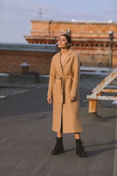 Regular fit coat with an H silhouette. This single-breasted coat has two horizontal pockets in the seam and two side cuts so that you comfortably walk around the city. The warmed version of this camel coat is perfect for spring ant autumn. We can add the insulation to the coat for the weather below 0oC. If you want us to do this, PM us, and we will reply you as soon as possible. Lining: 100% viscose SIZE All our clothes are made to order, so please allow 5 - 7 business days for production. This Camel Long Coat For Workwear, Camel Long Coat For Work, Neutral Long Wool Coat For Fall, Long Camel Wool Coat For Work, Camel Long Wool Coat For Workwear, Neutral Long Wool Coat For Work, Neutral Long Wool Coat, Camel Wool Coat For Winter, Camel Lapel Collar Outerwear For Winter