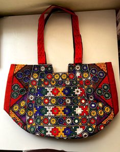 Sindhi cultural handicraft, ladies bag, light in weight and easy to carry.. Traditional Handheld Bag For Daily Use, Rectangular Hobo Bag For Everyday Use And Festivals, Handmade Multicolor Festival Bags, Handmade Multicolor Bags For Festivals, Traditional Handheld Bag For Everyday Use, Multicolor Handmade Bags For Festivals, Handheld Multicolor Bags With Handwork, Multicolor Rectangular Potli Bag For Daily Use, Handmade Rectangular Shoulder Bag For Festivals