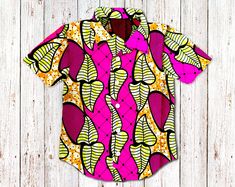 IMPORTANT, PLEASE READ SHIPPING INFO BELOW BEFORE PLACING YOUR ORDER A stylish boys short sleeve button-down shirt made luxurious 100% cotton Ankara fabric, perfect for special occasions or casual days. Matching girls dresses available in the shop. These shirts are available from size 1 year up to 14 years.  Contact me to request additional sizes. IMPORTANT, PLEASE READ BEFORE PLACING YOUR ORDER Average processing time before dispatch is 3 days. For express shipping please contact me to request Pink Cotton Hawaiian Shirt For Summer, Pink Cotton Short Sleeve Camp Shirt, Pink Cotton Shirt With Camp Collar, Pink Printed Hawaiian Shirt With Short Sleeves, Pink Printed Short Sleeve Hawaiian Shirt, Fitted Short Sleeve Graphic Print Shirt, Short Sleeve Printed Pink Camp Shirt, Pink Printed Shirt With Camp Collar, Fitted Printed Camp Shirt With Short Sleeves