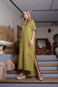 If you want a solid linen dress - that's a choice! Asymmetrical long green color linen dress would make you feel awesome.  This dress is made of 100% washed, natural Baltic linen (EU) GIFT - FREE SHIPPING WORLDWIDE * ENLI5 Linen - it's our family creation... for you with love... _ DESCRIPTION  - made from 100% Baltic linen - asymmetrical length  - dress has two comfortable pockets  - model height is 5.7ft (174 cm.) she wears size M - handmade by ENLI5 Linen family in Lithuania (EU) - Color may vary due to different displays * WHY TO CHOOSE US? Every dress is made individually for our clients. If you need small changes in size, please write us a message and together we would find the solution. Our linen is twice washed, so it gets better shape, stylish wrinkles and  indescribable tenderness Vacation Maxi Dress Solid Relaxed Fit, Solid Color Relaxed Fit Maxi Dress For Vacation, Relaxed Fit Solid Color Maxi Dress For Vacation, Relaxed Fit Solid Color Maxi Dress For Summer, Plain Maxi Dress For Beach, Vacation Linen Dress Solid Color, Solid Color Linen Vacation Dress, Plain Linen Summer Dress, Long Green Solid Color Dress