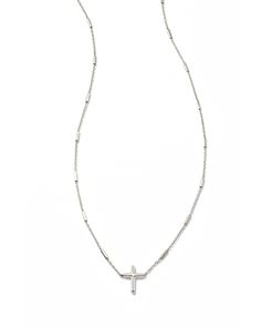 Sweet, symbolic, and soon-to-be a collection staple. The Delicate Cross Pendant Necklace in 14k White Gold is a forever reminder of what matters to you most. White Gold Cross Pendant Necklace Gift, Elegant White Cross Pendant Necklace, White Cross Necklace For Everyday, Cross Necklace Kendra Scott, Gift-ready Brilliant Cut White Gold Cross Necklace, Large Pendant Necklace, Cross Pendant Necklace, Pretty Jewellery, White Diamond