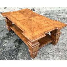 an old coffee table sitting on the ground