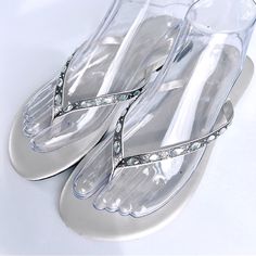 Nwot, Excellent New Condition, Never Worn Pretty Sun & Sky Rhinestone Silver Flip Flop Thong Sandals Women’s Size Medium 7-8 Perfect For The Beach Or Pool This Summer Diamond Shaped Faceted Rhinestones On Straps No Stones Missing A Linear Mark Or Impression Is Present On The Right Footbed As Shown Next To Last Photo Manmade Upper And Outsole With Textile Ships From Smoke Free And Pet Free Home Silver Open Toe Flip Flops With Rhinestones, Silver Rhinestone Open Toe Flip Flops, Summer Rhinestone Toe Post Flip Flops, Elegant Silver Flip Flops For Summer, Summer Toe Post Flip Flops With Rhinestones, Silver Flip Flops For Party, Silver Rhinestone Flip Flops, Elegant Silver Beach Flip Flops, Silver Party Flip Flops