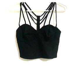 Strappy Black Top Never Worn Fabric: 58% Rayon 38% Nylon 4% Spandex Price Is Firm Unless Bundled All Items With Emoji Are 3 For $20 Bundle & Save! Black Elastane Top For Party, Black Strappy Tops For Party, Black Strappy Party Tops, Black Party Tops With Straps, Edgy Black Tops With Straps, Black Strappy Top For Spring, Fitted Black Top With Straps, Fitted Strappy Evening Tops, Black Elastane Crop Top For Spring