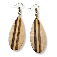 Our Inlay Wood Earrings are a beautiful and unique gift for the special people in your life. They feature a variety of wood, shaped to a teardrop shape, and finished with a touch of copper ear wires. Measuring at 3 inches with ear wires, these earrings are a perfect size and make a wonderful addition to any outfit. Give the gift of style and elegance with our Inlay Wood Earrings for any season! Unique Brown Earrings For Gift, Artisan Brown Earrings For Gift, Nature-inspired Teardrop Earrings For Gifts, Natural Color Jewelry For Gifts With Pierced Ears, Natural Color Jewelry For Pierced Ears As A Gift, Natural Color Dangle Jewelry For Gifts, Natural Jewelry For Pierced Ears As A Gift, Natural Color Earrings For Gift, Natural Colored Jewelry Set With Matching Earrings For Gifts