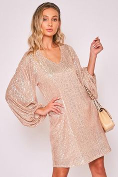 Gorgeous rose gold dress with a v-neckline and sequins! Lined and true to size. Rose Gold Party Dress, Rose Gold Clothes, Rose Gold Sequin Dress, Anniversary Dress, Sparkle Outfit, Rose Gold Dress, Long Sleeve Sequin Dress, Sequence Dress, Gold Sequin Dress